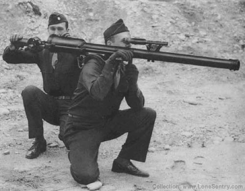 [57-mm Recoilless Rifle: Firing from Kneeling Position]